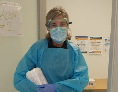 This image has an empty alt attribute; its file name is Lesley-Gallagher-in-PPE-v2-383x300.jpg
